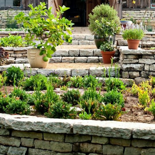 garden with stacked stone walls